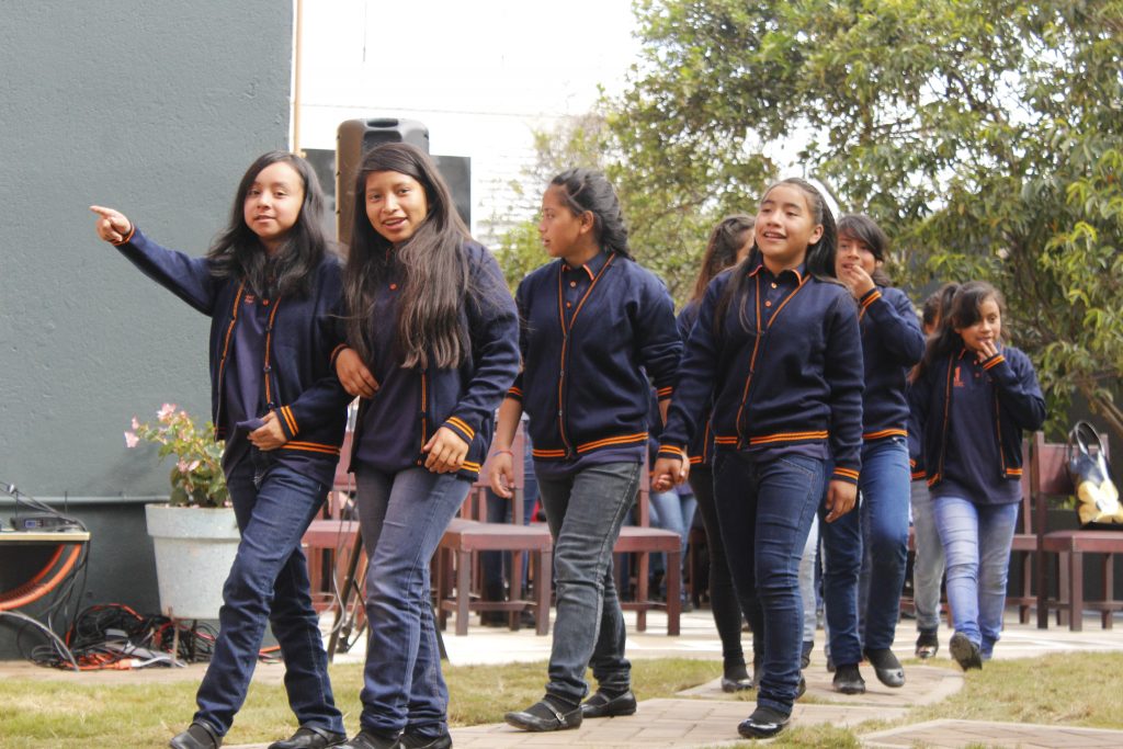 girl scholars walking to school